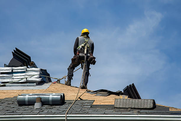Professional Roof Replacement technician working in Elwood, NJ